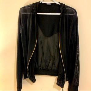 Translucent hooded Black Jacket with golden zipper